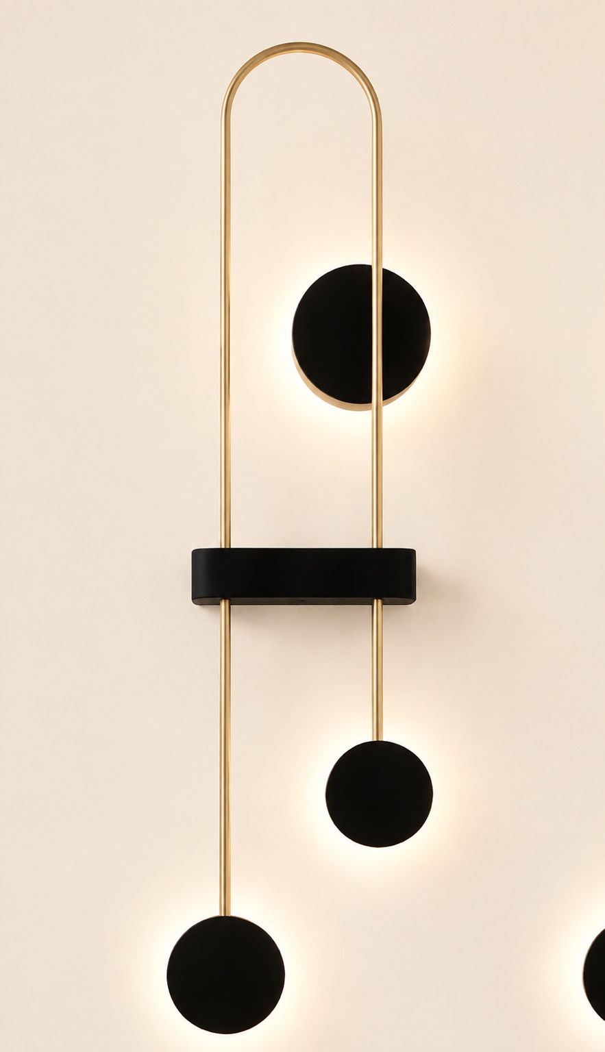 Black and gold wall light with circular shades