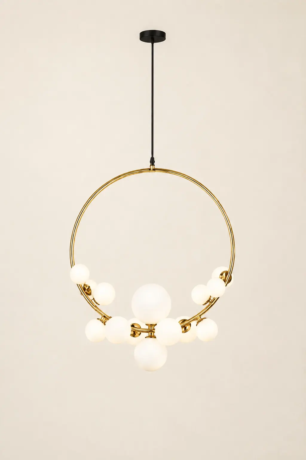 Modern circular gold pendant with opal glass globes