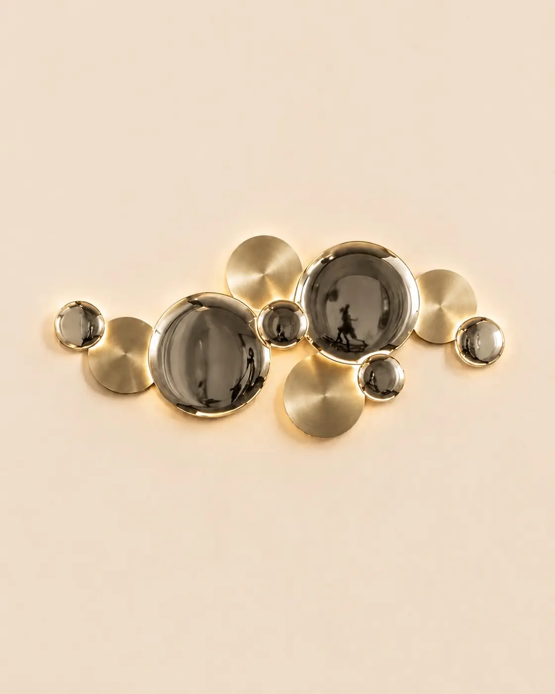 Round gold and smoky wall lamp